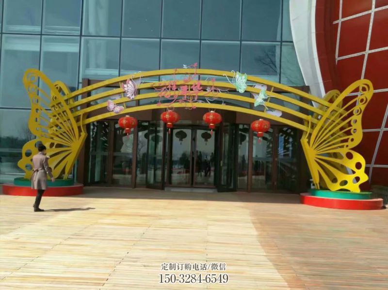 日照蝴蝶拱门雕塑,镂空烤漆效果,不锈钢小区标识雕塑 日照蝴蝶拱门雕塑,镂空烤漆效果,不锈钢小区标识雕塑